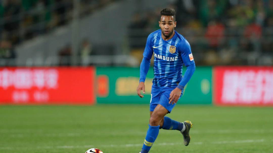 BEIJING, CHINA - APRIL 05: Alex Teixeira #10 of Jiangsu Suning in action during the 2019 China Super League between Beijing Guoan and Jiangsu Suning at Workers Stadium on April 5, 2019 in Beijing, China. (Photo by Fred Lee/Getty Images)